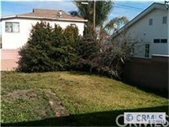 Large lot extends beyond the detached garage.  Ple