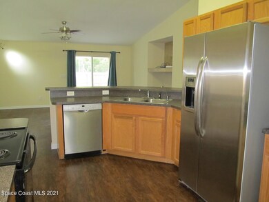 Kitchen Overlooks Family Room