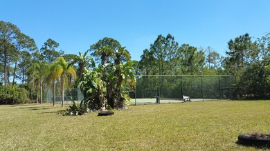 Play Area & Tennis Court