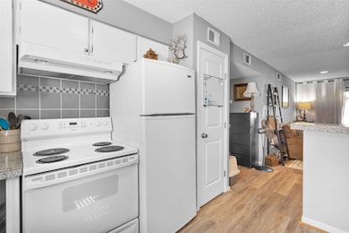 Range and Refrigerator included
