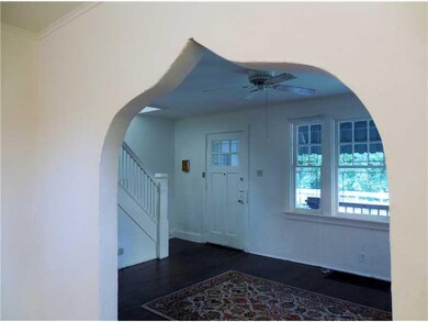 Living Room.  Lov the Archway!