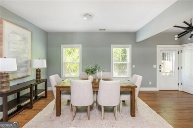 Dining room with wood finished floors and baseboards