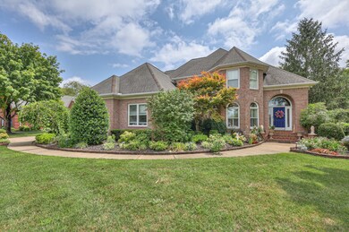 Professionally landscaped, large level corner lot!
