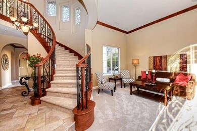 Formal Living Room with Baseboards and New Carpet 