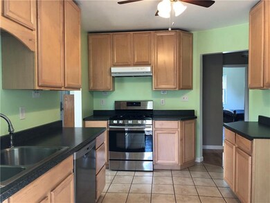 Lovely kitchen featuring maple cabinets , under ca