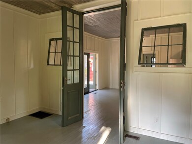 Living room looking into kitchen
