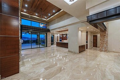The open floorplan offers views to the amazing bac