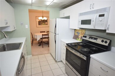 Undated kitchen with a new oven and dishwasher