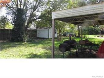 Large back yard with covered patio