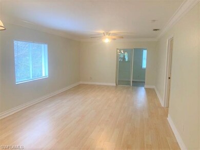 Family room leading to closed in lanai area