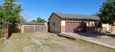 View of property exterior with brick siding, a garage, concrete driveway, and a shingled roof