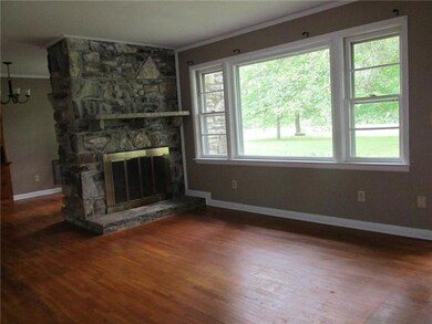 Formal Living Room with stone fireplace