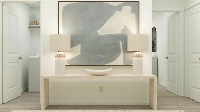 Interior details with wood-type flooring and washe