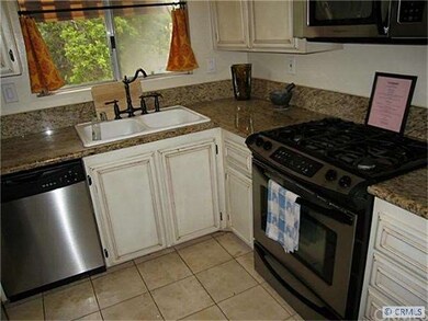 Remodeled kitchen with a gas stove,  granite count
