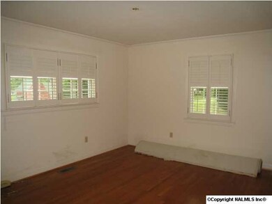 Formal dining with hardwood floors
