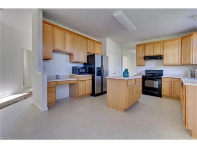 Behind that is the very open kitchen with center i