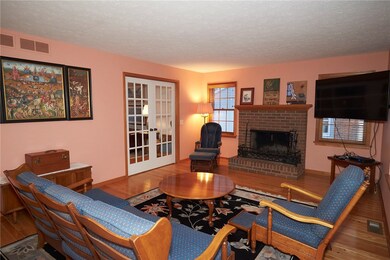 Family Room w/ Woodburning Fireplace