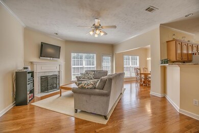  Great Room with fireplace-door to patio & pass  through to Kitchen and separate formal Dining room.