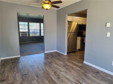 Dining room looking in to living room and kitchen 