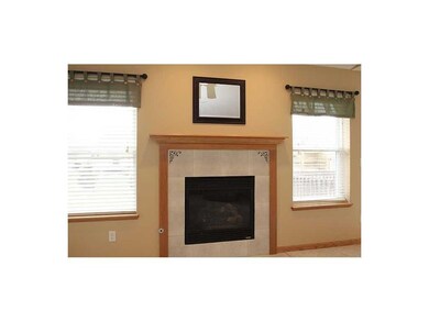 Great Room. Gas fireplace with tile surround and o