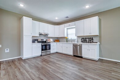 Whip up culinary delights while soaking in the abundant natural light that floods through the large windows, by creating a warm and inviting ambience throughout the home.