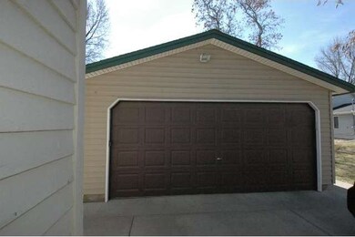 The two car garage and concrete driveway are suppl