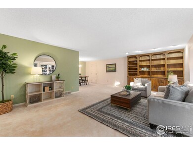 Main floor living room with built in cabinets