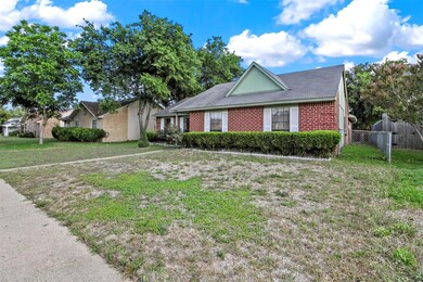 Ranch-style house with a front lawn