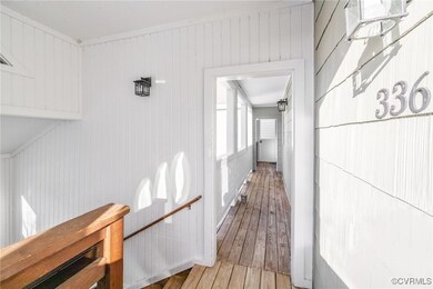 Hallway with wooden walls and hardwood / wood-styl