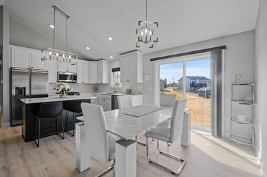Kitchen pairs perfectly with dining space.