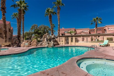 Community pool featuring a community hot tub and a