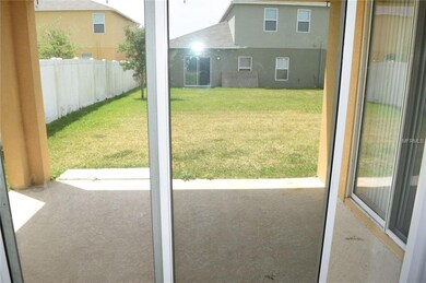 Covered patio and yard.