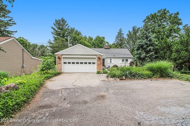 1121 N Waverly Rd, Lansing, MI 48917 - photo 2