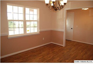 Formal dining room looking toward foyer