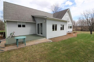 The driveway comes up to the back deck on this hom