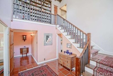 Grand entryway with 2 story ceiling and 