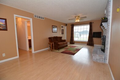 Large open space with laminate floors.
