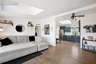 Open Concept Living Room/ Kitchen. Perfect for hos