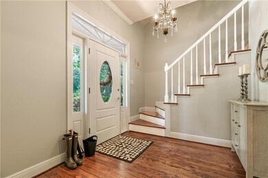 FOYER WITH WOOD FLOORS