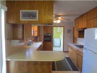 VIEW FROM FAMILY ROOM TO KITCHEN