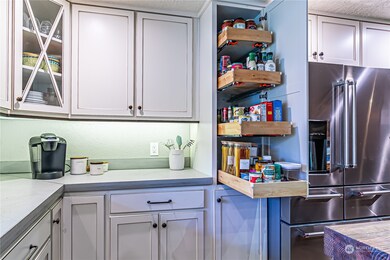 These cabinet drawers pull out for helpful convenient  storage.