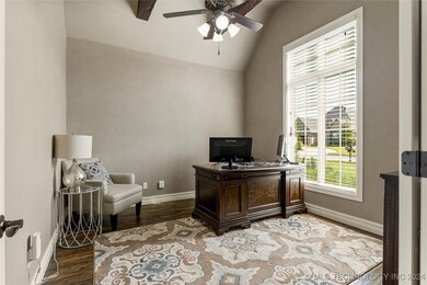 The Study features hardwood floors, beams, & vault