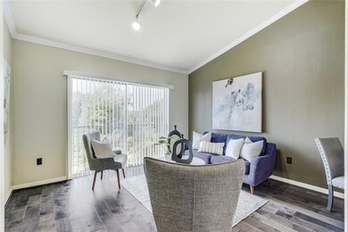 Living room with hardwood / wood-style floors, lof