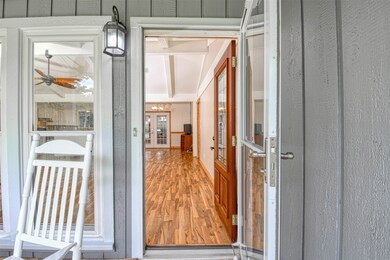 Laminate floors throughout the home and Tile in the bathrooms