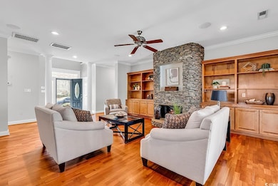 Living area featuring light wood-type flooring, de