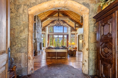 View of vaulted ceilings and grand living area fro