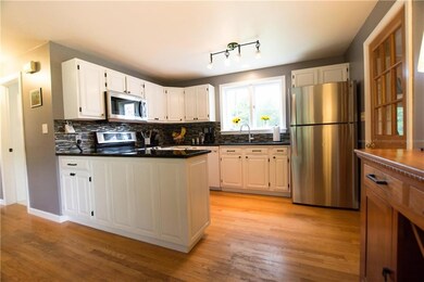 The kitchen is updated, stylish, and...