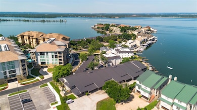 Aerial view of residential area with a large body