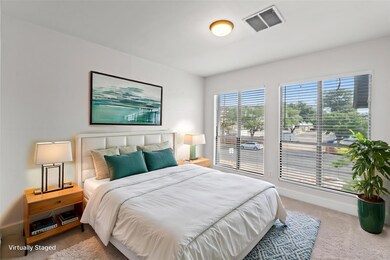 Bedroom with carpet and baseboards
