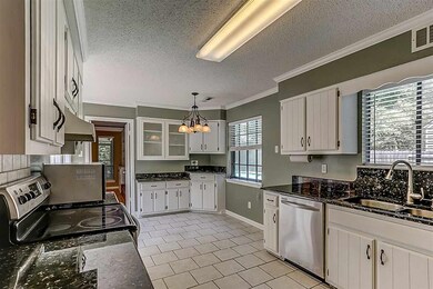 This fantastic kitchen has granite counters, and s